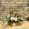 Flowers in a purse!

Purse colors options:
Natural (Brown) (Deluxe &amp; Premium Only)
Turquoise
Baby Blue