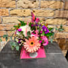 Flowers in a purse!

Purse colors options:
Natural (Brown) (Deluxe &amp; Premium Only)
Turquoise
Baby Blue