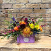 Flowers in a purse!

Purse colors options:
Natural (Brown) (Deluxe &amp; Premium Only)
Turquoise
Baby Blue
