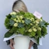 Spring box with green garden roses ,succulents and greenery