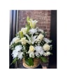 This elegant floral arrangement in all-white tones evokes purity and tranquility. With