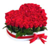 A modern flower arrangement in a heart box filled with roses.

DETAILS
This heart