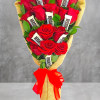 Surprise them with a beautiful petite bouquet of red roses and mini