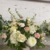Beautiful flowers arranged elegantly in a wicker basket