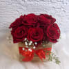 12 fresh red roses and Ferrero chocolates, in a wooden box, to