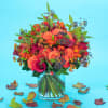 Beautiful fall floral arrangement with fall colors made with roses, mini calla