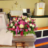 Lovely mix of blooms arranged in a Casket Spray.