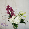 Experience the epitome of floral elegance with our stunning V-shaped arrangement. Featuring