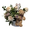 This charming box arrangement combines romantic roses and cheerful alstroemerias, creating a