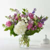With its soothing color harmony, the Violet Caress Bouquet will envelop your