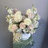 Delicate. Timeless. Beautiful. Our soft flower arrangements in a vase are a