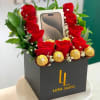 esta conformada ,9 rosas,6chocolastes ,la caja puede agregar regalo de tu preferencia
