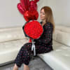Gorgeous red roses in a black wrap
Standard - 48-50 roses 
Deluxe -