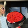 Gorgeous red roses in a black wrap
Standard - 48-50 roses 
Deluxe -