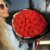 Gorgeous red roses in a black wrap
Standard - 48-50 roses 
Deluxe -