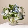 Let this uplifting arrangement be reminders of the clear skies ahead. Capturing