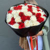 Bouquet of premium white and red roses in a black wrap.
Standard -