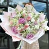 Bouquet of peonies, lisianthus, carnations, alstroemerias and stocks. 