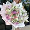 Bouquet of peonies, lisianthus, carnations, alstroemerias and stocks. 