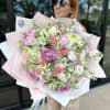 Bouquet of peonies, lisianthus, carnations, alstroemerias and stocks. 