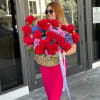 Big basket of purple and red roses, hydrangeas and chrysanthemums