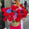 Big basket of purple and red roses, hydrangeas and chrysanthemums