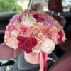 Perfect mix of garden roses, peonies, spray roses and other gorgeous flowers.