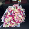 Large bouquet of peonies, roses, spray roses, lisianthus in pink and blue