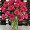The perfect gift! One dozen elegant long-stemmed roses tastefully arranged with babies&#039;