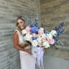 Large box of roses, ranunculus, delphiniums and hydrangeas 