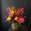 Luxury Line Floral with in season local tropicals in a fresh pineapple