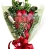 Hand floral arrangement of 12 roses, wrapped in decorative paper
