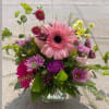 This sweet bouquet comes in a cube vase, perfect for the table