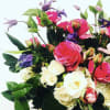 A mixture of spring blooms with hydrangea, gardens spray roses, greenery elements.