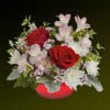 Light up your Valentine&#039;s Day with this romantic bouquet displayed in a