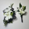 This Double Dendrobium White Orchid Corsage and Boutonniere Includes an Adult Size
