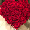 There are about 40-50 red roses in this arrangement. 
 
Please note