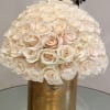 Ecuadorian 50-60 premium roses tucked in a gold hatbox. 
Each arrangement recreated