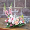Mixed flowers arranged around a reusable Crystal cross.