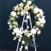 22&quot; Wreath of lilies, mums, tulips, freesia and hydrangea accented with dark