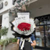 A wrapped bouquet of flowers is a beautifully arranged collection of blooms