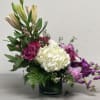  A graceful and sophisticated composition, the Enchanted Elegance Floral Arrangement is