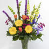 A simple vase of colorful flowers  to express the remembrance of