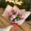 Beautiful tulips hand tied in colors of pink, white &amp;reds. Our designers