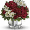 The red roses and white alstroemeria are traditional favorites. The chic mirrored