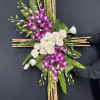 Beautiful river cane cross, white roses, and purple dendrobium orchids