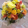 This arrangement with be made with vibrant yellows and orange  in