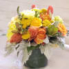This arrangement with be made with vibrant yellows and orange  in