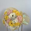 A burst of sunshine captured in a bouquet! This lively mix features