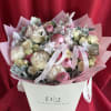 Introducing our enchanting Christmas bouquet, a delicate blend of light whites and